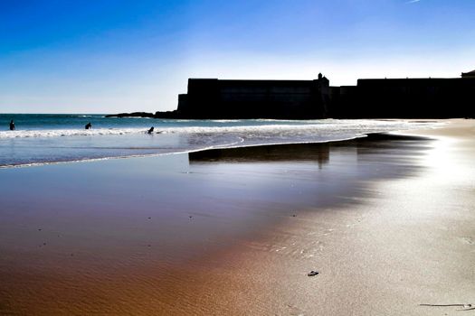 Beautiful beach called Praia da Torre in Lisbon, Portugal, in a sunny day of Spring