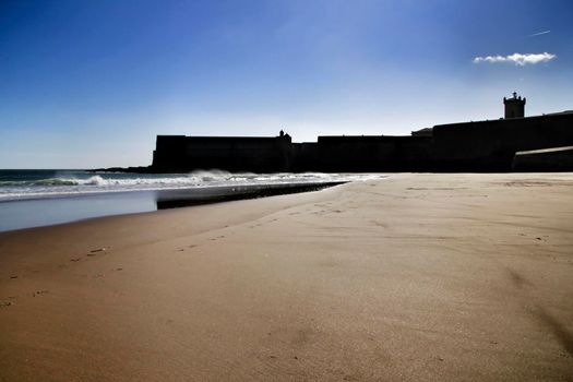 Beautiful beach called Praia da Torre in Lisbon, Portugal, in a sunny day of Spring