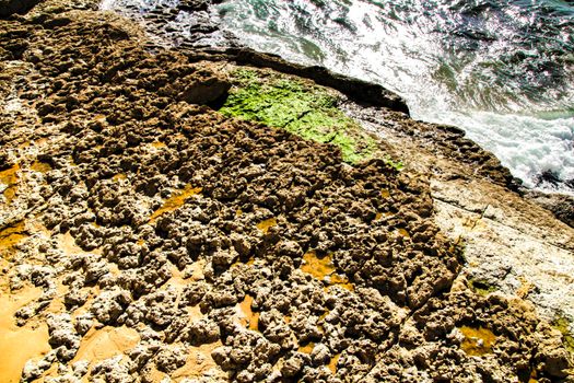 Beautiful Azarujinha beach with rock formations in Estoril, Lisbon, Portugal, in a sunny day of winter