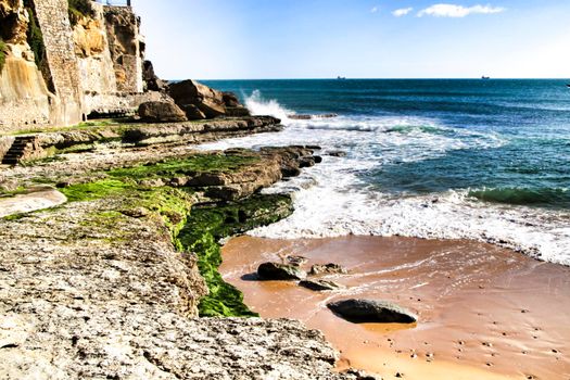 Beautiful Azarujinha beach with rock formations in Estoril, Lisbon, Portugal, in a sunny day of winter