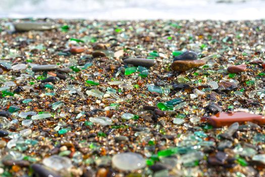 Glass beach of Vladivostok. Natural background of sea glass.