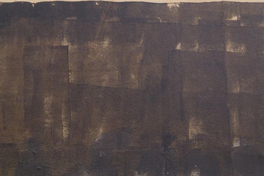 carelessly painted dark grey flat surface - texture and full frame background.