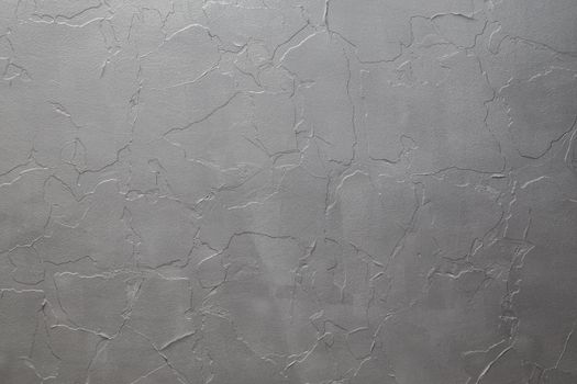 Peeled paint flat surface covered with a new layer of matte metallic silver paint. Full frame background and texture.