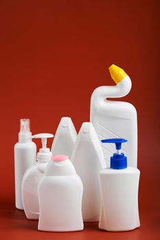 A various shapes blank white plastic bottles of soap products.