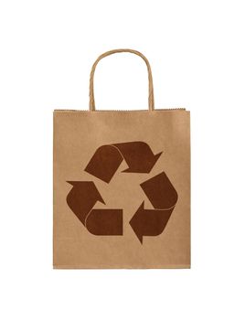 Close up one natural brown paper shopping or gift bag with recycling symbol isolated on white, low angle front view