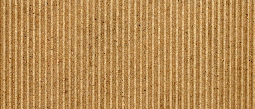 wide brown corrugated cardboard texture useful as a background