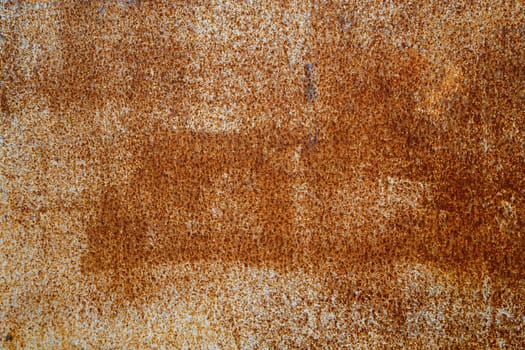 abstract background and texture of white peeling paint surface with orange rust spots.