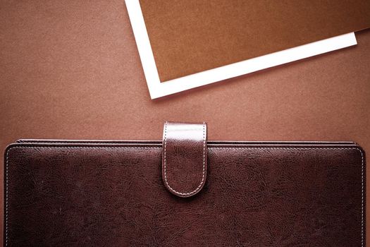 Productivity, work and corporate lifestyle concept - Vintage business briefcase on the office table desk, flatlay background