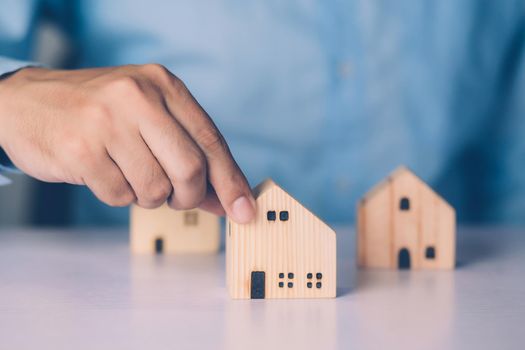 Insurance house for security and care, real estate, costs and loan and mortgage, protection of home and advisor with investment in residential, assurance of property for finance, business concept.