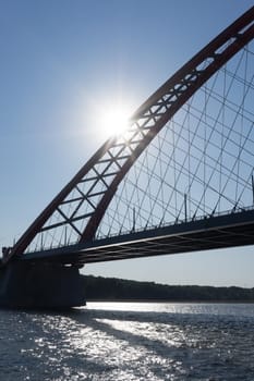 Natural landscape with a river and a bridge in the light of the contour. Novosibirsk, Russia