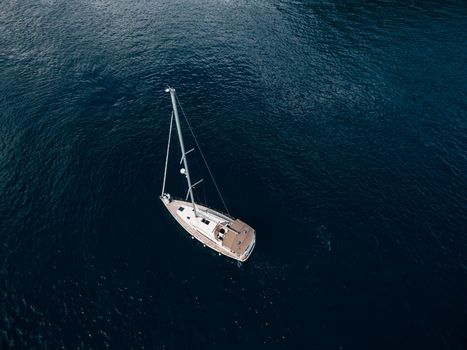 Top view of a sailing yacht sailing on the sea. High quality photo