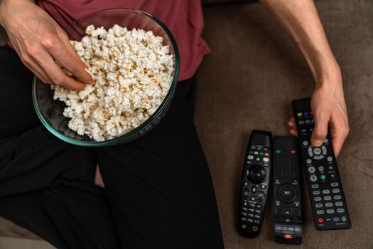 remote control and popcorn when watching a movie and broadcasting.