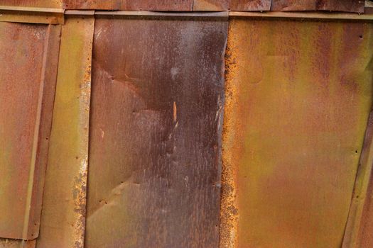 rusted tin sheets patchwork wall texture and flat detailed background