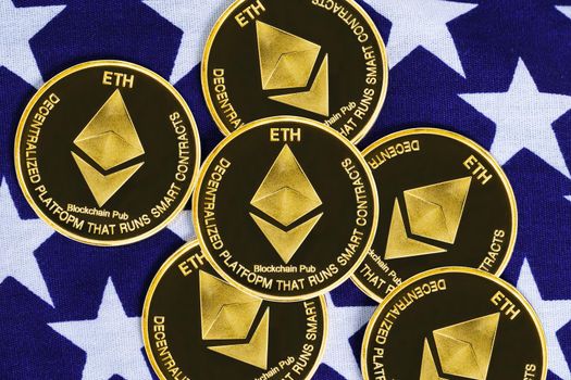 Crypto currency concept. Gold Ethereum coin on flag of United States of America USA