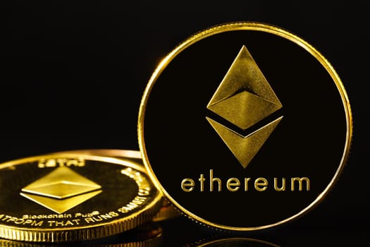 Ethereum cryptocurrency digital bit coin ETH currency concept ,Golden coin with Ethereum symbol on a black background