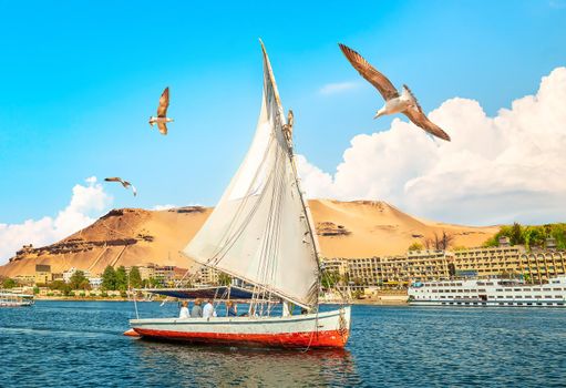 Sailboat in Aswan city on river Nile, Egypt