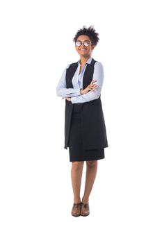 Full length portrait of African American black mixed race attractive young businesswoman student standing with arms folded isolated on white background