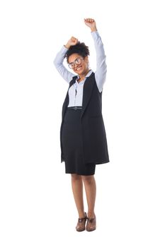 Full length portrait of African American black mixed race attractive young businesswoman student cheering with her arms raised isolated on white background