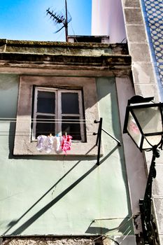 Old and typical facade in the street of Lisbon
