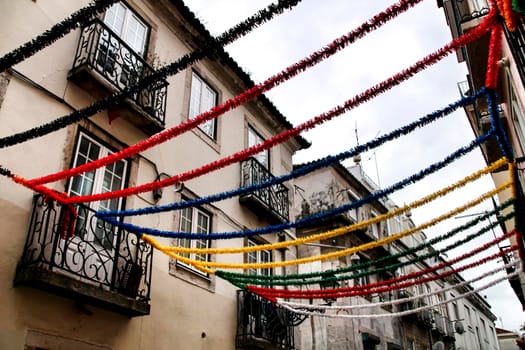 Narrow and colorful streets, majestic facades, windows and balconies of Lisbon, Portugal