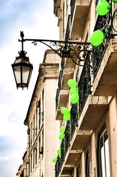 Narrow and colorful streets, majestic facades, windows and balconies of Lisbon, Portugal