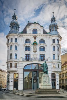 Monument to Gutenberg in the downtown Vienna before the building of ancient department store, Austria