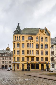 Street with Cat House in the old town of Riga, Latvia