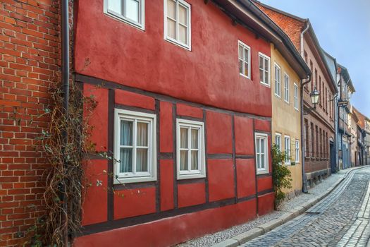 Sstreet with historical half-timbered houses in Quedlinburg, Germany