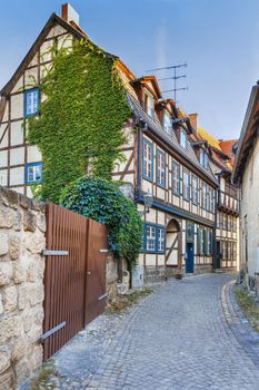 Sstreet with historical half-timbered houses in Quedlinburg, Germany