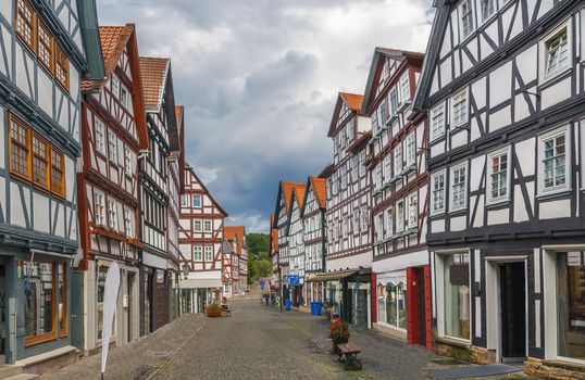 Street with historical half-timbered houses in downtown of Melsungen, Germany