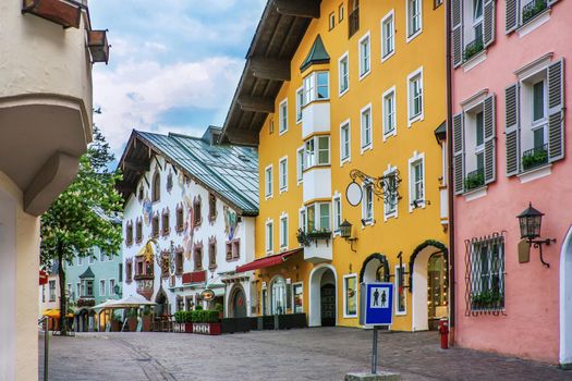 Street with historical houses in Kitzbuhel city center, Austria