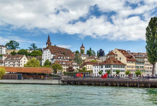 Historical buildings on the embankment of Reuss river in Lucerne, Switzerland