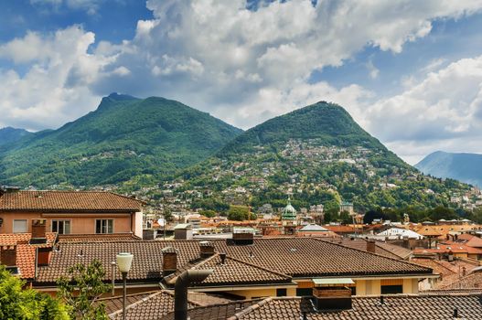 View of Monte Bre mountain and roofs of Lugano city, Switzerland