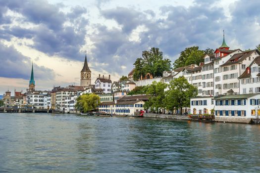 View of embankment of Limmat river with historic houses in Zurich, Switzerland