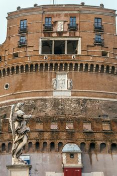 Mausoleum of Hadrian, usually known as Castel Sant'Angelo (Castle of the Holy Angel), is a towering cylindrical building in Parco Adriano, Rome, Italy. 