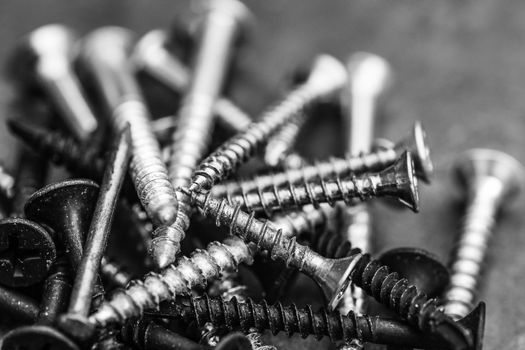 Different Kind of Screws on a table in a workshop