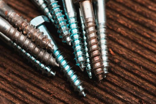 Different Kind of Screws on a table in a workshop