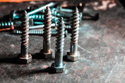 Different Kind of Screws on a table in a workshop