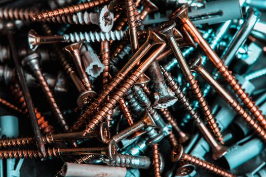 Different Kind of Screws on a table in a workshop