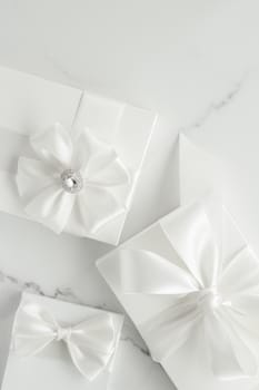 Romantic celebration, lifestyle and holiday present concept - Luxury wedding gifts on marble