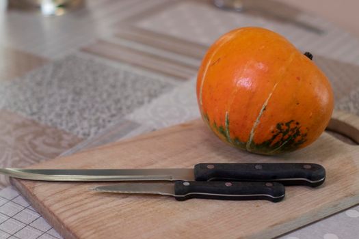 the process of making a Halloween pumpkin. horror theme and Hallowe'en.