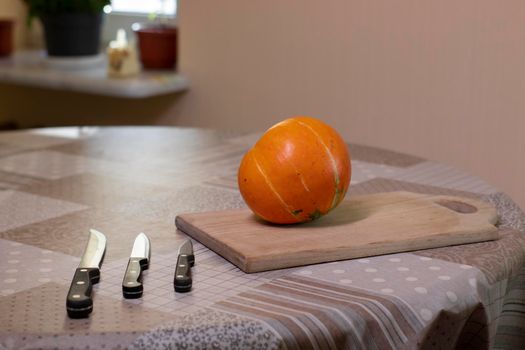 the process of making a Halloween pumpkin. horror theme and Hallowe'en.