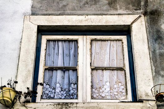 Old and colorful damaged facade in Lisbon