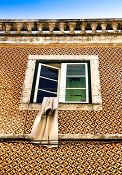 Old and colorful damaged facade in Lisbon