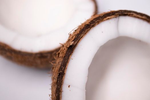 opened coconut isolated on white background. tropical fruit, nut.