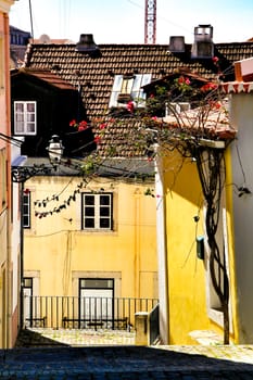 Narrow and colorful streets, majestic facades, windows and balconies of Lisbon, Portugal