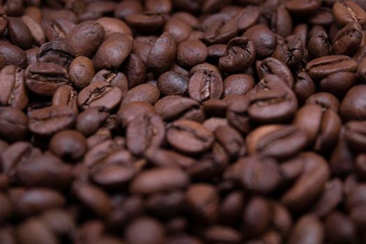 close up Freshly roasted coffee beans background. top view.