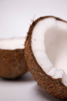 opened coconut isolated on white background. tropical fruit, nut.