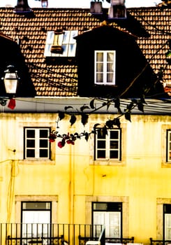 Narrow and colorful streets, majestic facades, windows and balconies of Lisbon, Portugal