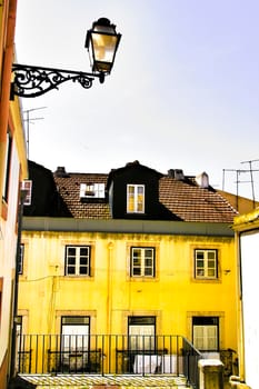 Narrow and colorful streets, majestic facades, windows and balconies of Lisbon, Portugal